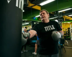 TITLE Boxing Fight Back Navy and Yellow Leather Boxing Gloves – Rock Steady Edition -Title Boxing Store FBBGLGR 3