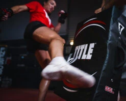 TITLE Boxing Gel Ripple Strike Shield – Multi-Handle Heavy Duty Kick Pad -Title Boxing Store GELSH BK LS 3 TITLE Boxing Gel Ripple Strike Shield