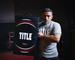 TITLE Boxing Gel Ripple Strike Shield – Multi-Handle Heavy Duty Kick Pad -Title Boxing Store GELSH BK LS 4 TITLE Boxing Gel Ripple Strike Shield