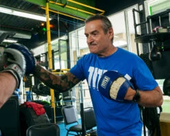 TITLE Boxing Rock Steady Micro Mitts – Parkinson's Athlete Protective Coaching Punch Mitts -Title Boxing Store RSBVLTMMBL 4