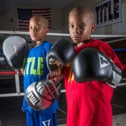 TITLE Platinum Proclaim Power Punch Mitts 11 TITLE Platinum Proclaim Power Punch Mitts -Title Boxing Store pprpm lifestyle