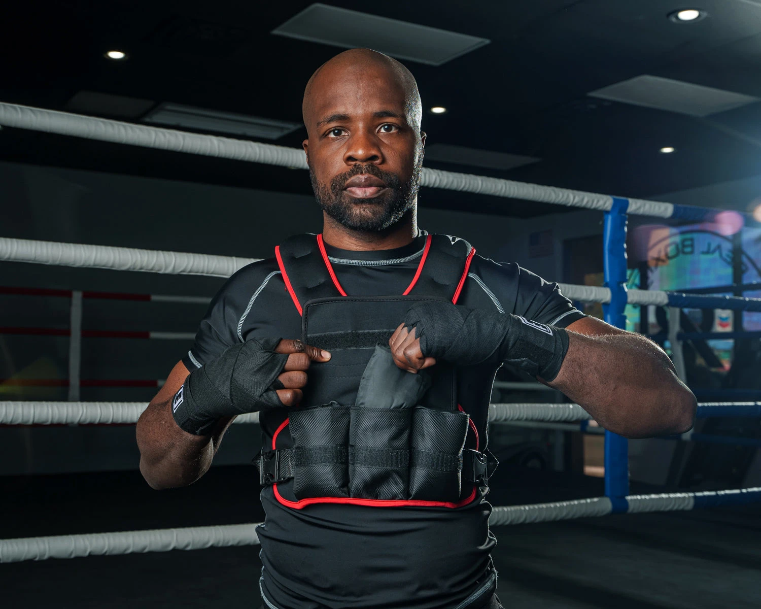 TITLE Boxing Extra Weighted Training Vest – Black with Reflective Safety Strips & Adjustable Weights 4 TITLE Boxing Extra Weighted Training Vest – Black with Reflective Safety Strips & Adjustable Weights - Image 4