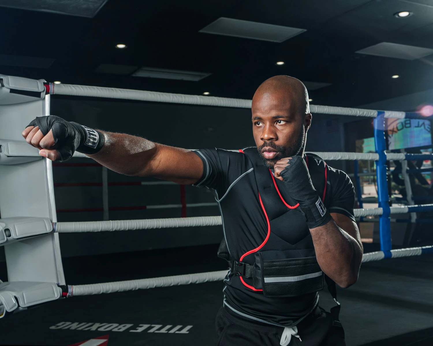 TITLE Boxing Extra Weighted Training Vest – Black with Reflective Safety Strips & Adjustable Weights 5 TITLE Boxing Extra Weighted Training Vest – Black with Reflective Safety Strips & Adjustable Weights - Image 5